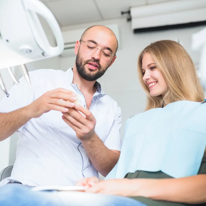 Woman at a socket preservation consultation in Deer Park, TX