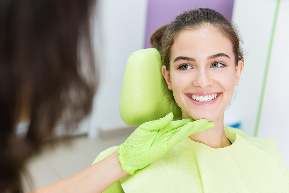 Woman at a dental exam in Deer Park, TX