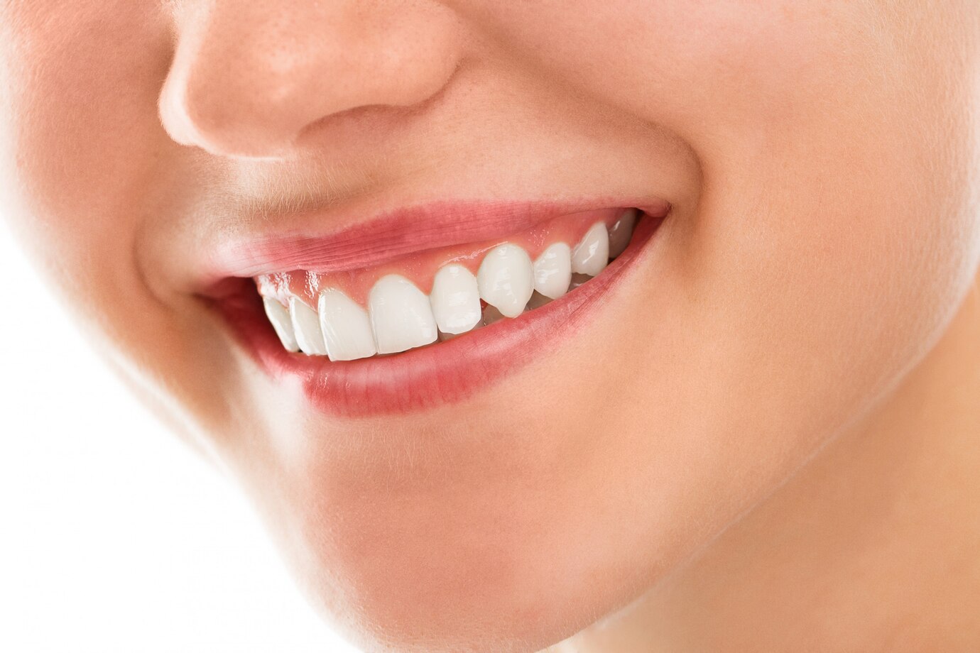 Woman smiling with dental sealants in Deer Park, TX