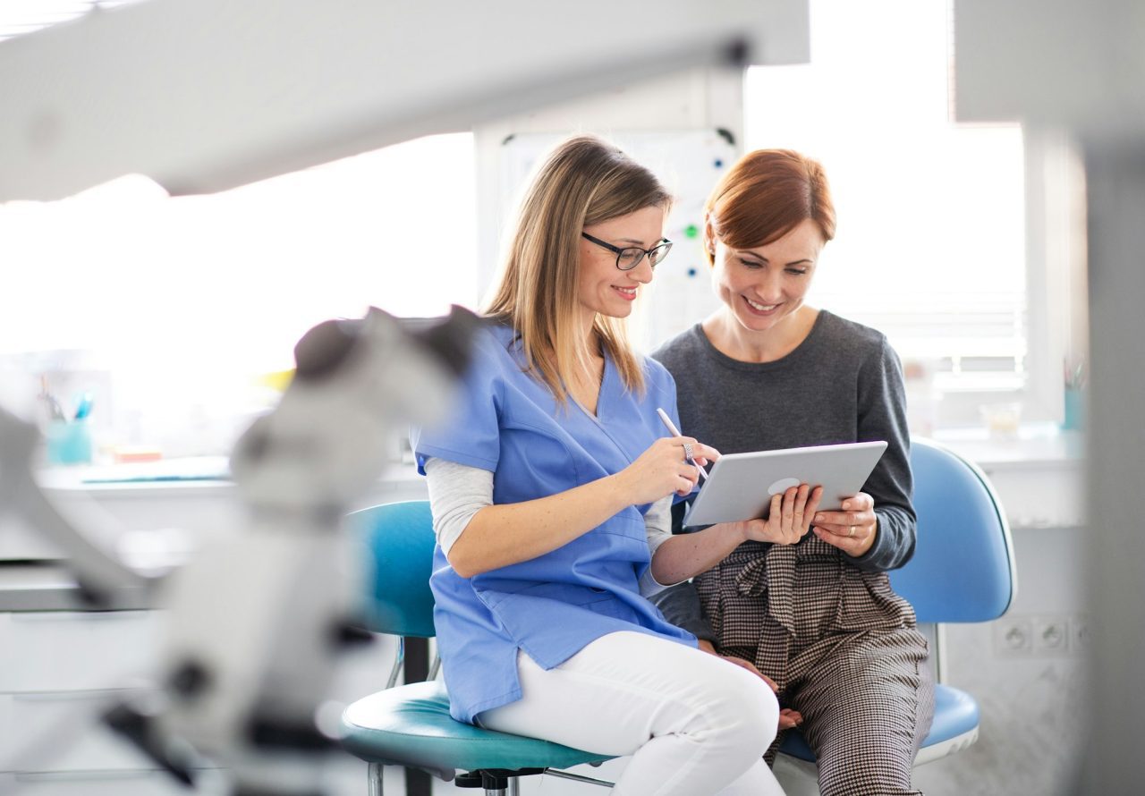 Woman visiting the emergency dentist in Deer Park, TX