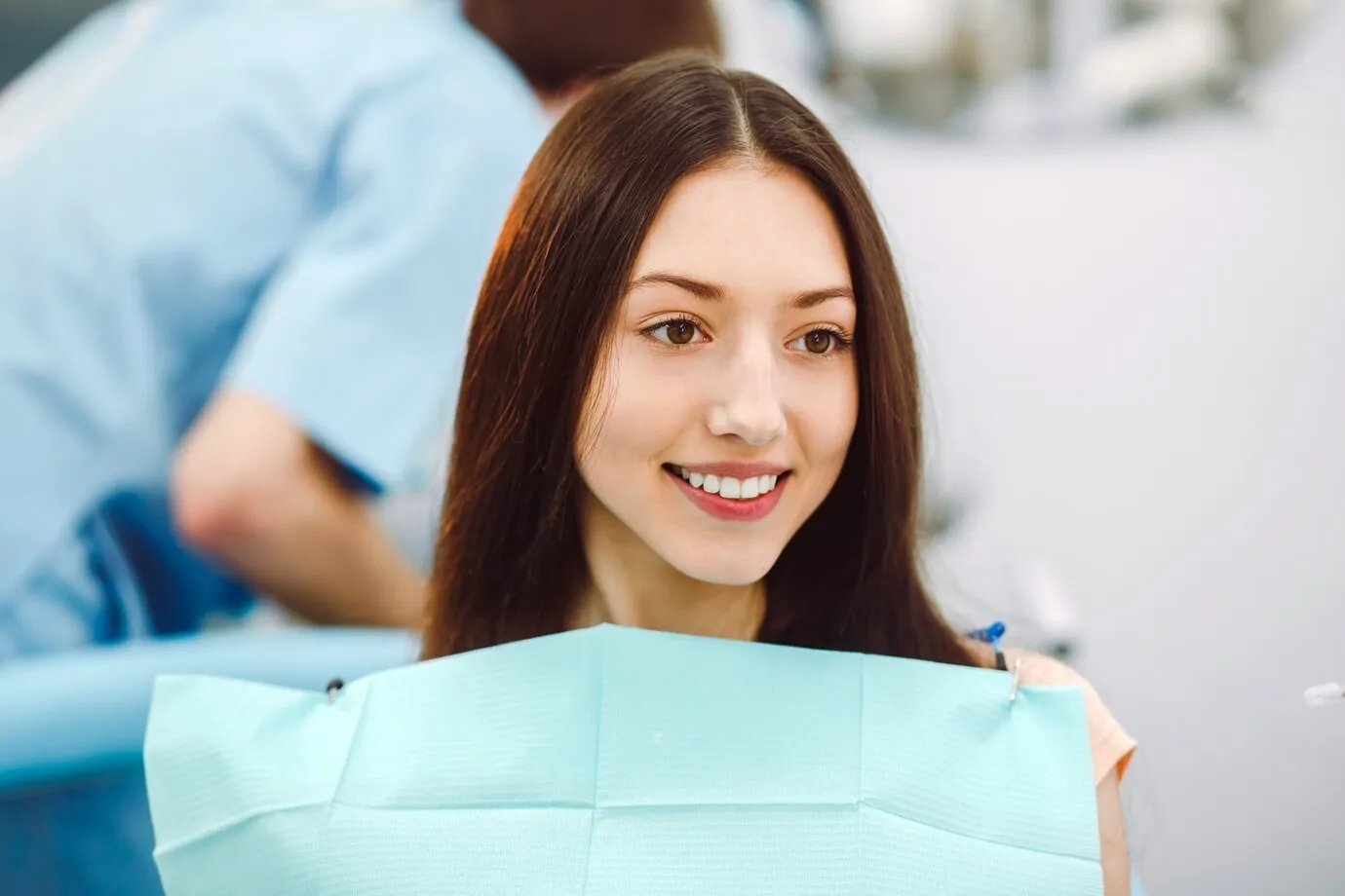 Woman at a dental implant bridge appointment in Deer Park, TX